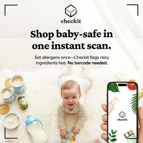 A baby laying on a fluffy white rug surrounded by baby products including jars of baby formula, a bottle, and a container of vitamins. A hand holds a smartphone with the Checkit app open, showing a baby-safe product.